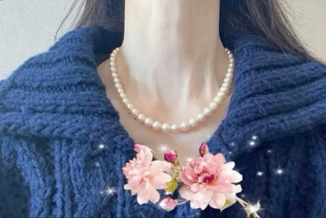 Tsutsumi Aurora Akoya pearl necklace and matching earrings with 8mm round pink-green pearls and silver clasps