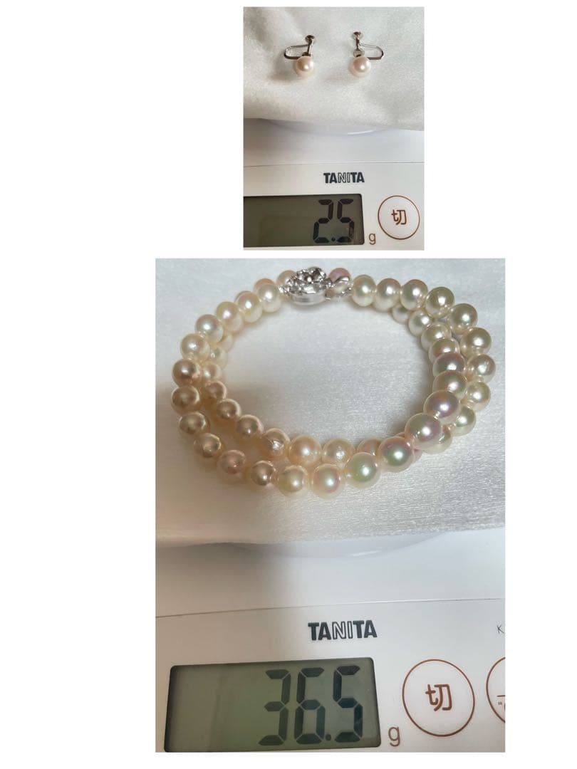 Tsutsumi Aurora Akoya pearl necklace and matching earrings with 8mm round pink-green pearls and silver clasps