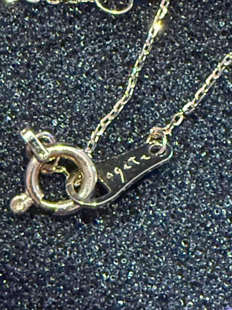 agete K10 gold necklace featuring a glowing opal pendant on a delicate chain