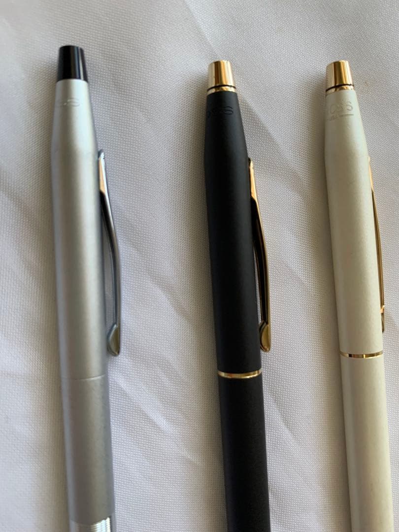 CROSS ballpoint pen set with two pens in black and white and one silver mechanical pencil