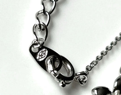 Tasaki baby pearl necklace with silver flower motif and 40 cm silver chain