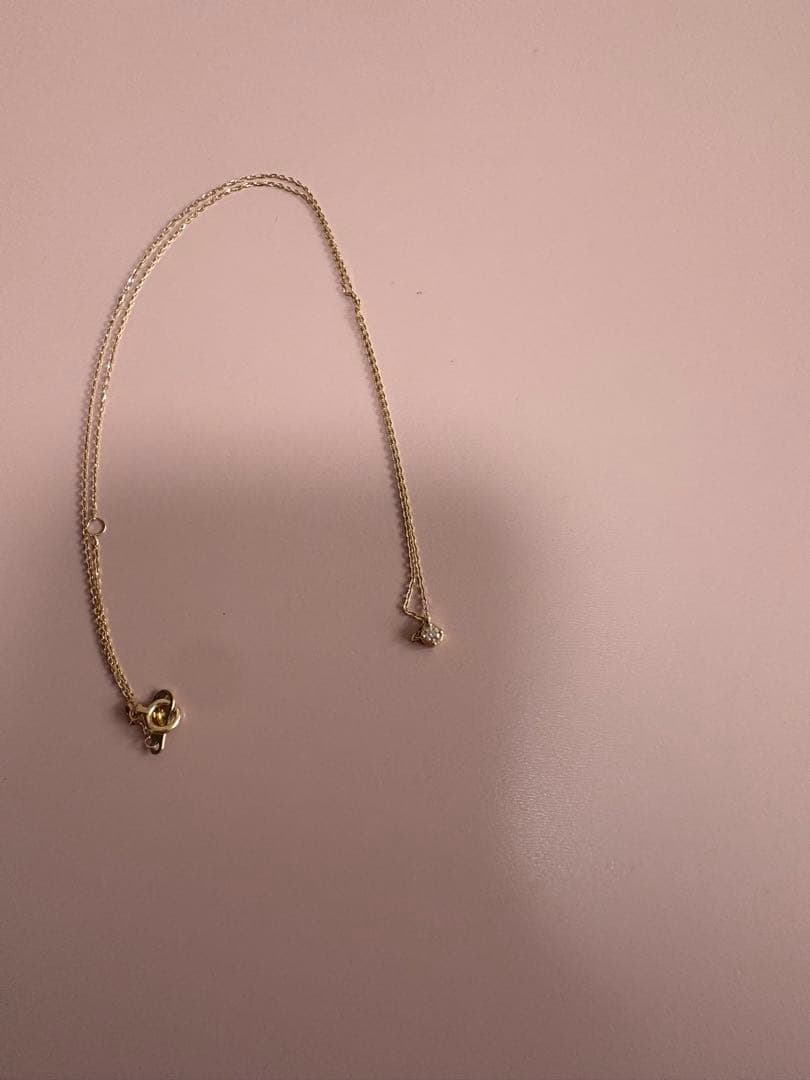 Agete Necklace made of 10 karat gold weighing 0.03 grams showcasing delicate design
