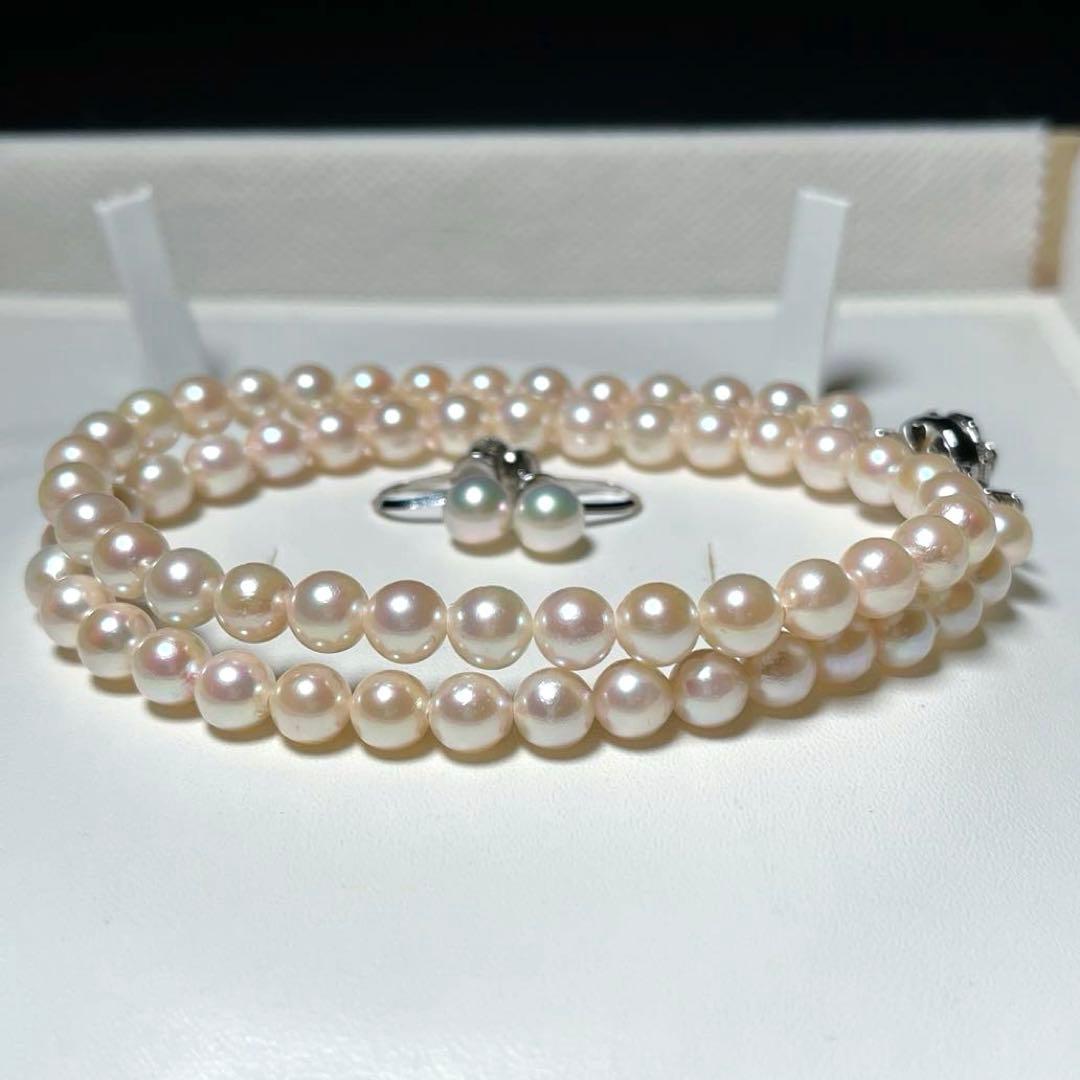 Akoya pearl necklace and earrings set with round 6.0-6.5mm pearls on silver material