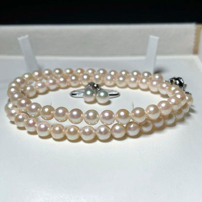 Akoya pearl necklace and earrings set with round 6.0-6.5mm pearls on silver material