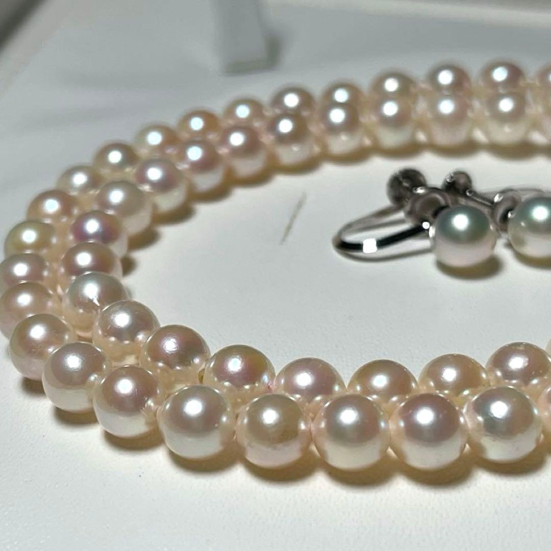 Akoya pearl necklace and earrings set with round 6.0-6.5mm pearls on silver material