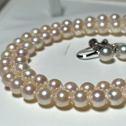 Akoya pearl necklace and earrings set with round 6.0-6.5mm pearls on silver material