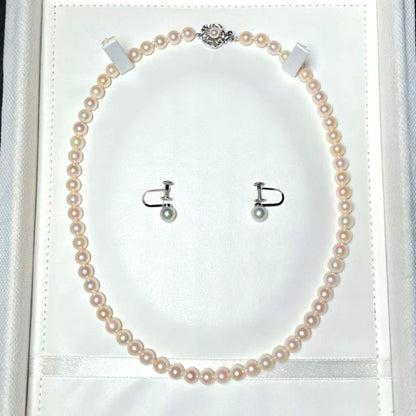 Akoya pearl necklace and earrings set with round 6.0-6.5mm pearls on silver material
