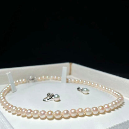 Akoya pearl necklace and earrings set with round 6.0-6.5mm pearls on silver material