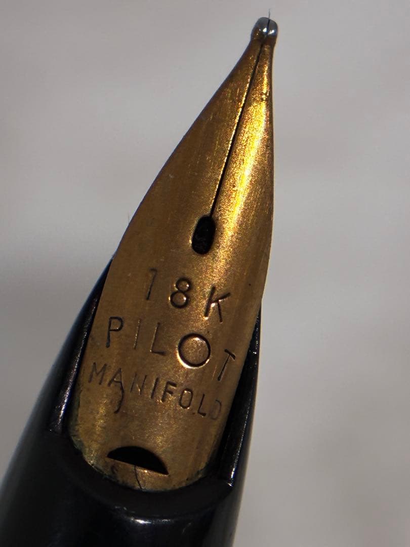 PILOT Fountain Pen 18K with gold nib and sleek black body shown in close-up