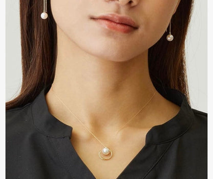 Akoya pearl necklace for women with single pearl moon motif pendant in 18K yellow gold on adjustable chain