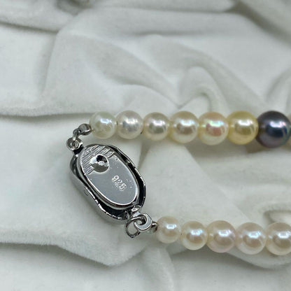 Multicolor Akoya pearl necklace with silver clasp featuring pearls from 4.0mm to 9.1mm in size