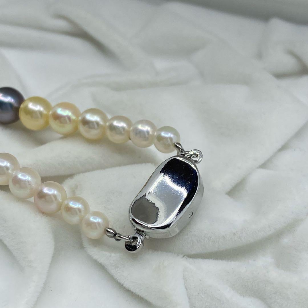 Multicolor Akoya pearl necklace with silver clasp featuring pearls from 4.0mm to 9.1mm in size