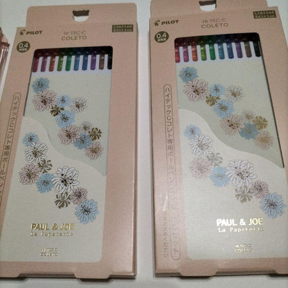 PILOT PAUL&JOE COLETO pen set showing 2 main bodies in pink and blue with 2 ballpoint pen refills