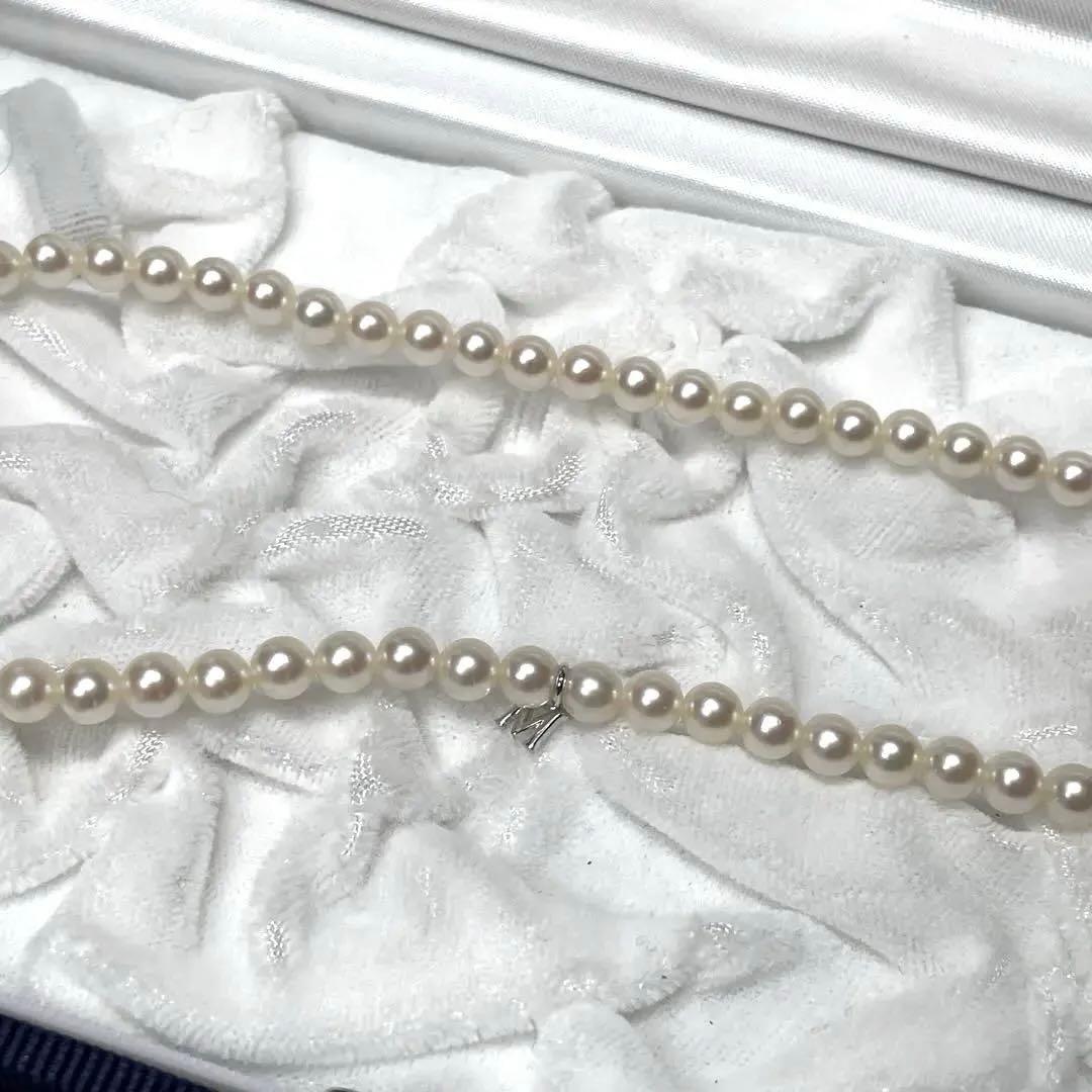 Mikimoto pearl necklace with 5.0-5.5mm Akoya pearls and M charm, 38 cm length