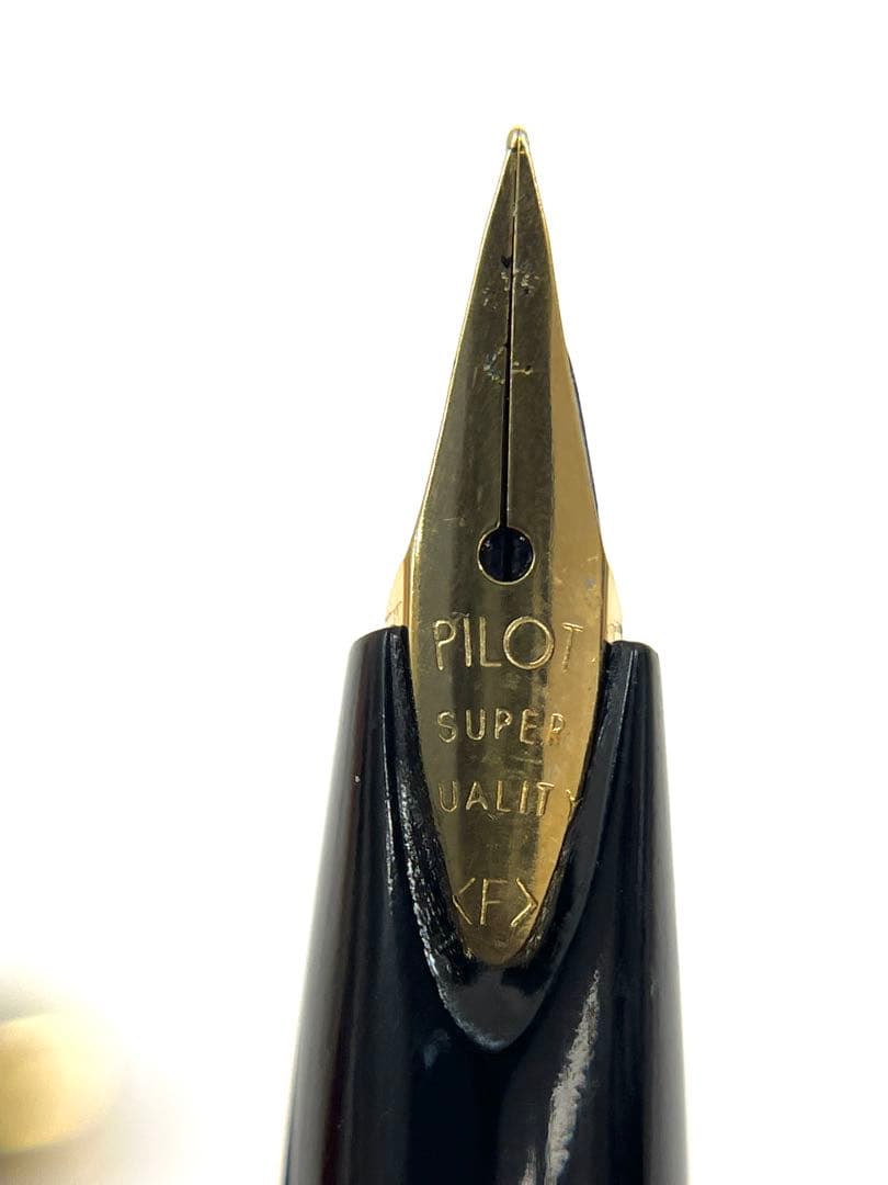PILOT SUPER QUALITY fountain pen with fine nib, black body, and gold decorative elements