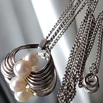 Vintage MIKIMOTO Akoya pearl necklace featuring three 6.5-7.5 mm pearls on a 40 cm silver chain