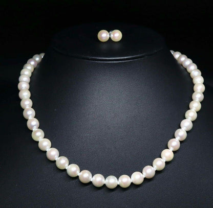 Akoya pearl necklace and earring set featuring 8.5-8.0mm white round pearls with silver fittings