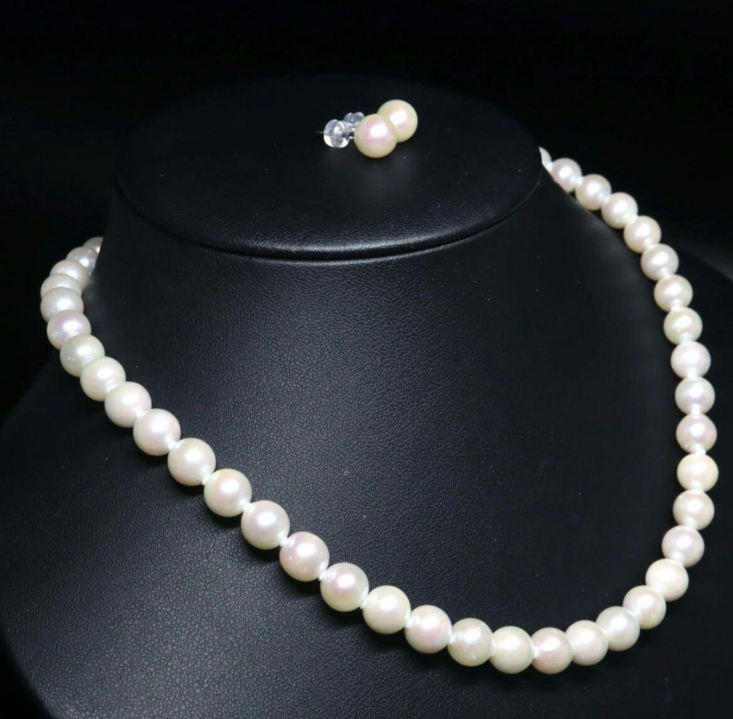 Akoya pearl necklace and earring set featuring 8.5-8.0mm white round pearls with silver fittings