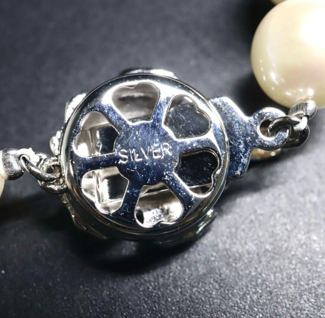 Akoya pearl necklace and earring set featuring 8.5-8.0mm white round pearls with silver fittings