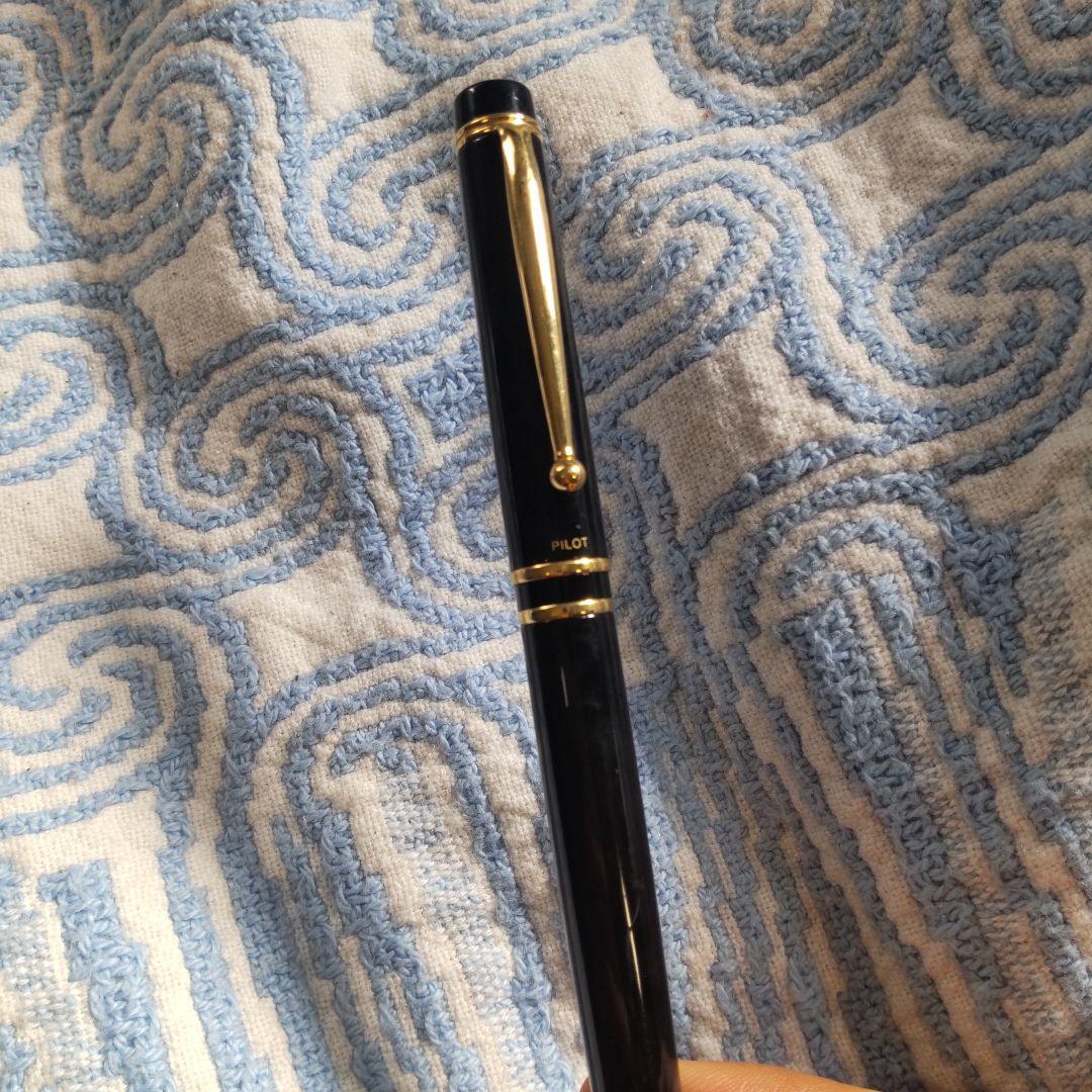 Black Pilot Fountain Pen shown with cap on, used condition