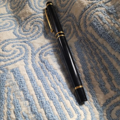 Black Pilot Fountain Pen shown with cap on, used condition