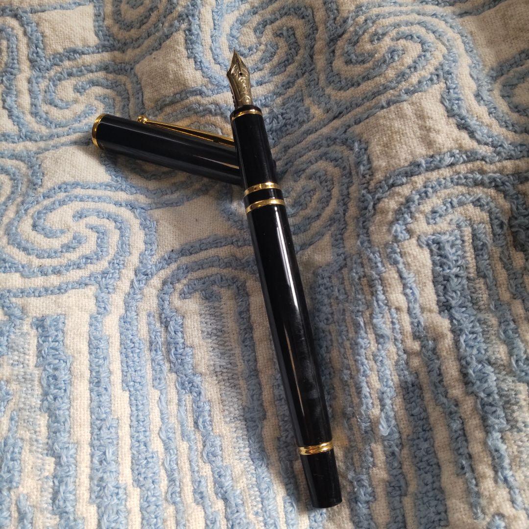 Black Pilot Fountain Pen shown with cap on, used condition