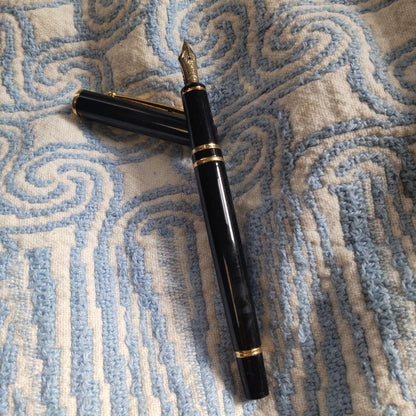 Black Pilot Fountain Pen shown with cap on, used condition
