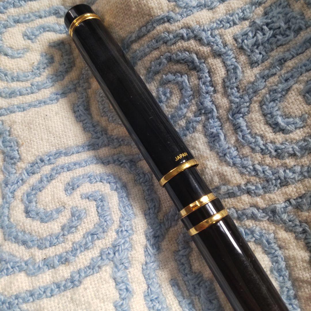 Black Pilot Fountain Pen shown with cap on, used condition