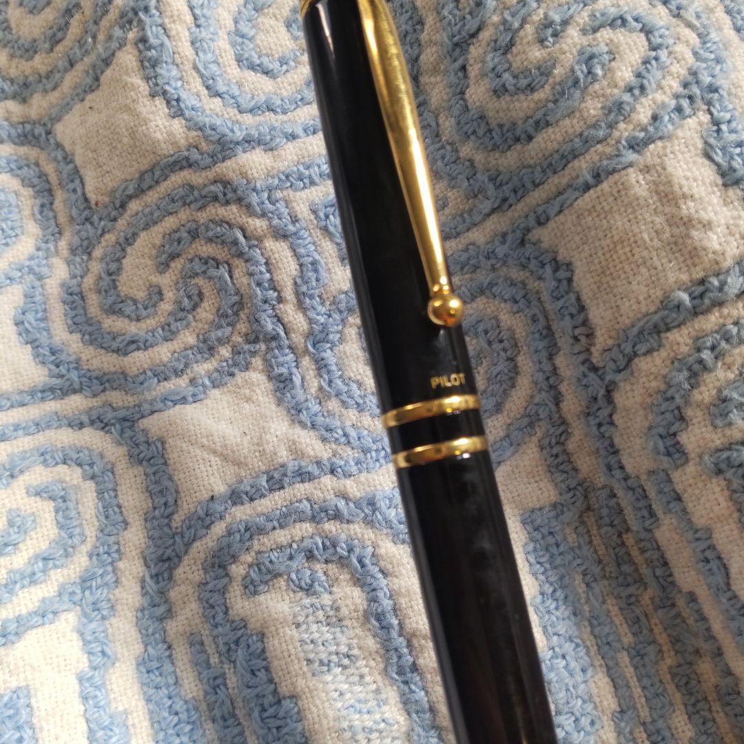 Black Pilot Fountain Pen shown with cap on, used condition