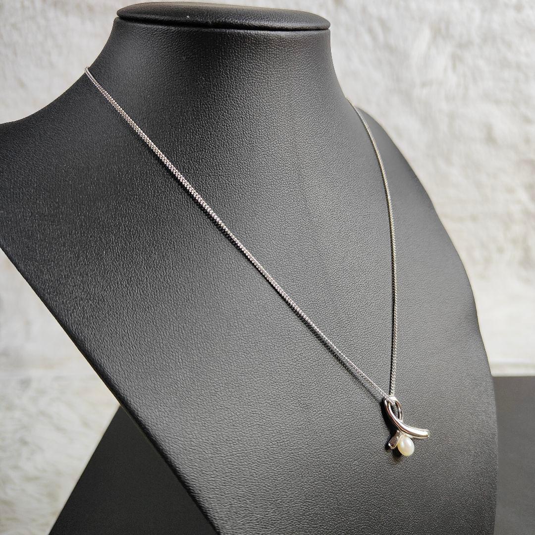 TASAKI pearl necklace with silver ribbon motif and genuine pearls on 40 cm chain