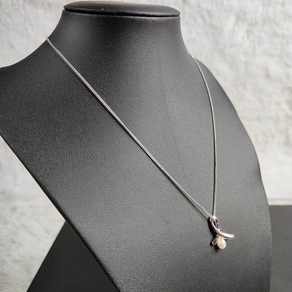 TASAKI pearl necklace with silver ribbon motif and genuine pearls on 40 cm chain