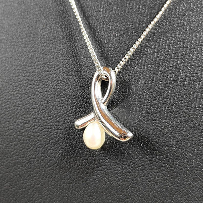 TASAKI pearl necklace with silver ribbon motif and genuine pearls on 40 cm chain