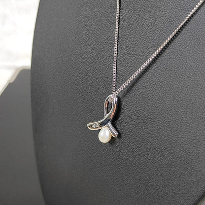 TASAKI pearl necklace with silver ribbon motif and genuine pearls on 40 cm chain