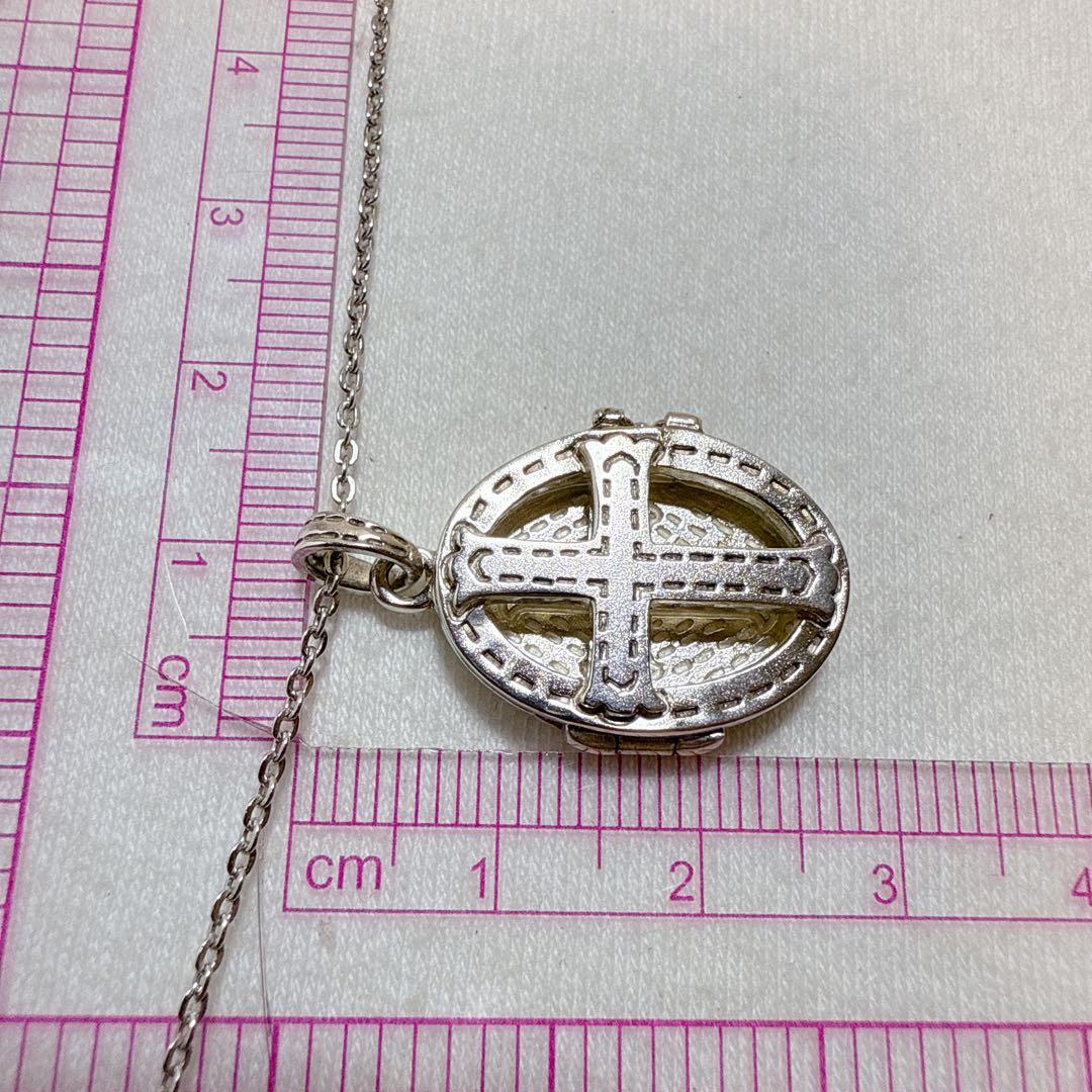 Agete silver pendant necklace featuring a cross rocket design on a 45.5 cm silver chain
