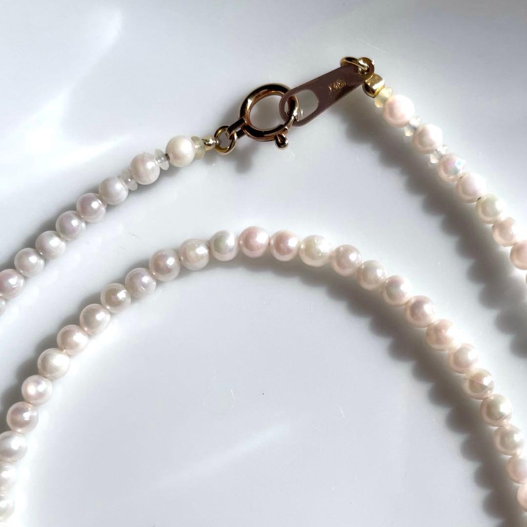 Small K18 Akoya pearl necklace featuring 2.6-3.0mm white pearls with pink and green hues on a 42cm chain