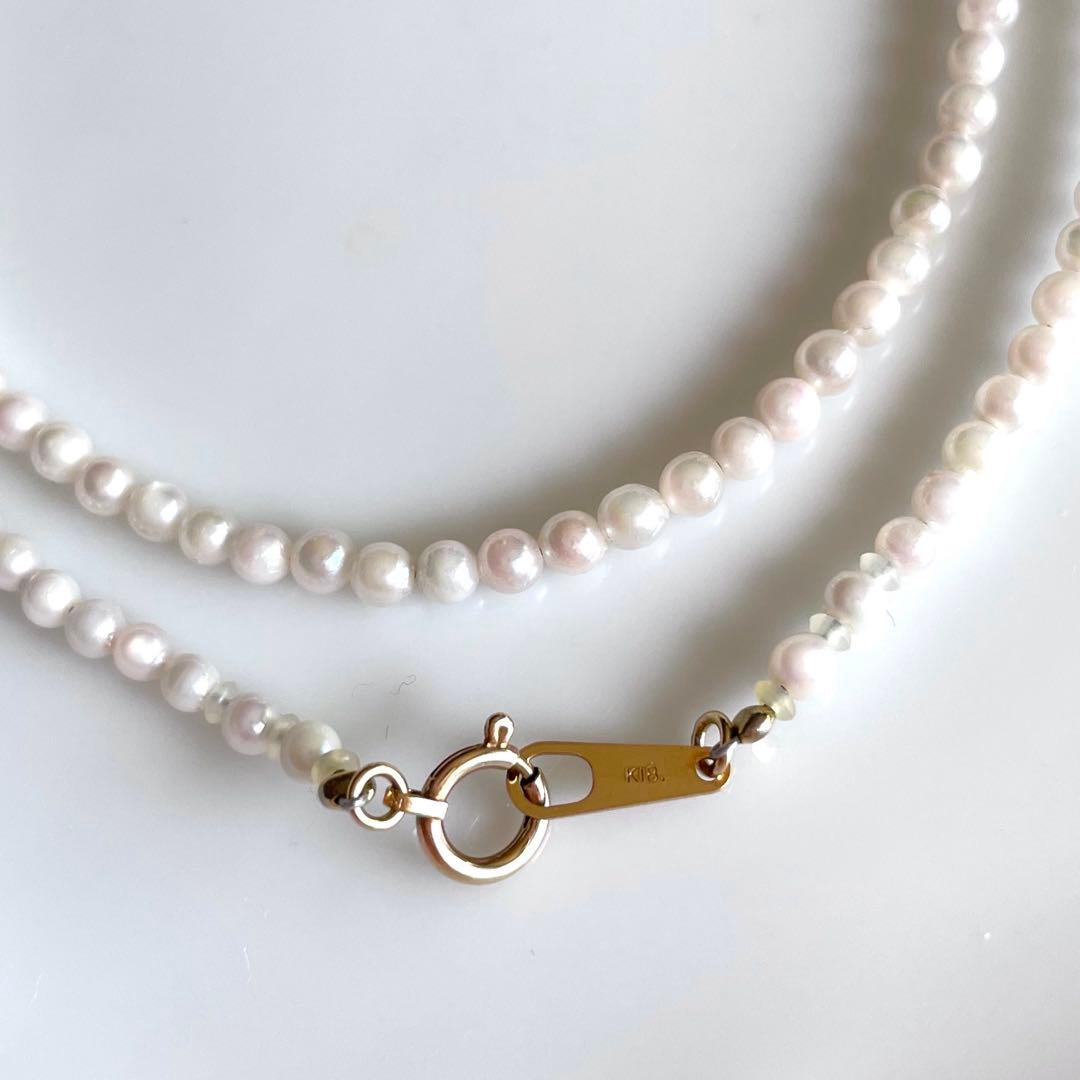 Small K18 Akoya pearl necklace featuring 2.6-3.0mm white pearls with pink and green hues on a 42cm chain