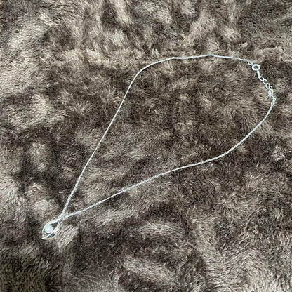 TASAKI silver necklace with a genuine pearl pendant measuring 1.8cm by 1cm on an adjustable 20.5cm chain