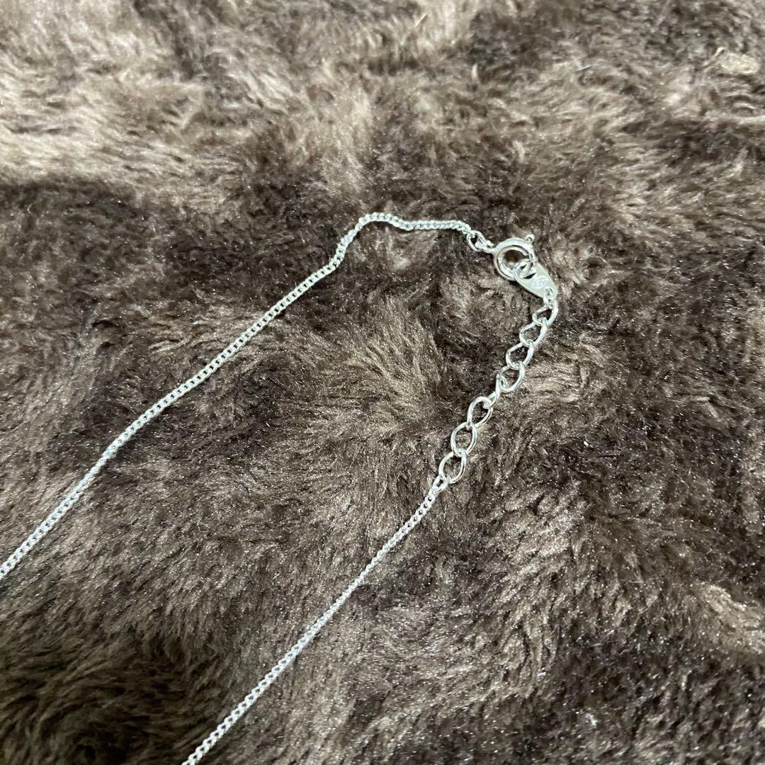 TASAKI silver necklace with a genuine pearl pendant measuring 1.8cm by 1cm on an adjustable 20.5cm chain