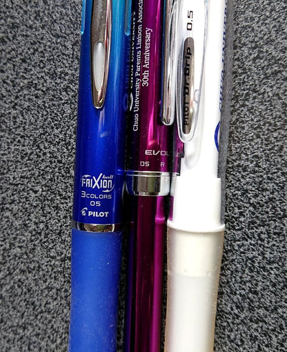 PILOT Limited Pen Set with blue gradient, violet, and white pens including Frixion Evolt and Dr. Grip models