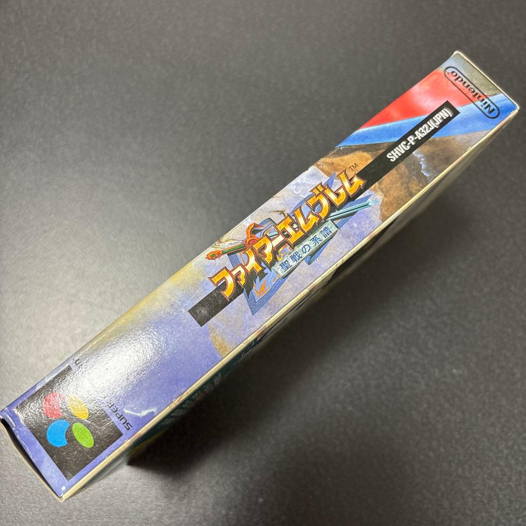 Fire Emblem: Seisen no KEI SNES game cartridge unopened with original outer box showing slight damage