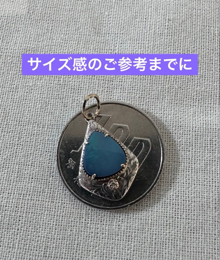 Agete charm made of K10 silver featuring opal and 0.008ct diamond measuring 1.25 by 2.3 cm