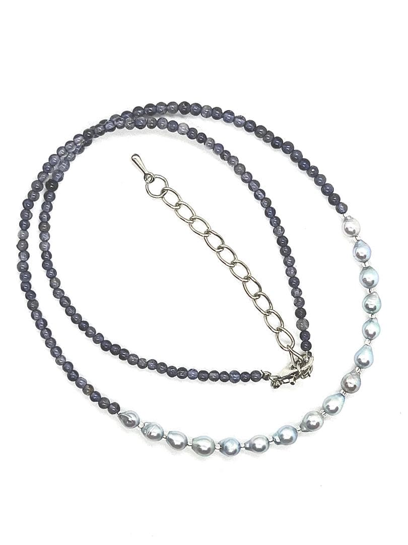 Akoya pearl necklace featuring natural blue baby pearls and small iolite stones on a 41 to 46 cm chain