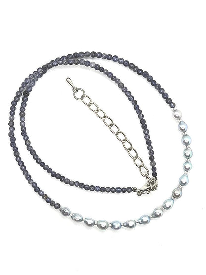 Akoya pearl necklace featuring natural blue baby pearls and small iolite stones on a 41 to 46 cm chain