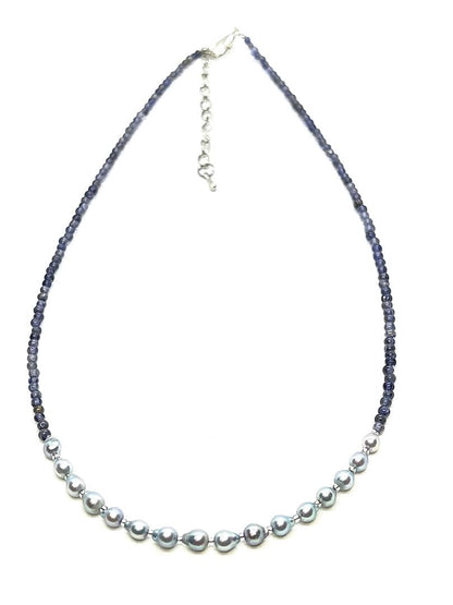 Akoya pearl necklace featuring natural blue baby pearls and small iolite stones on a 41 to 46 cm chain