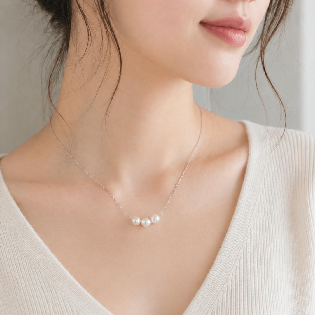 Platinum 6.5mm 3-row Andoya pearl necklace with 40cm chain on white background
