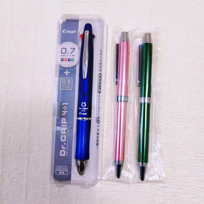 Set of three Pilot multi-function pens including two EVOLT 2+1 pens and one Dr.Grip 4+1 navy pen