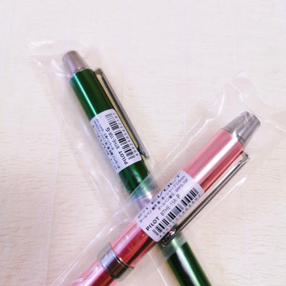 Set of three Pilot multi-function pens including two EVOLT 2+1 pens and one Dr.Grip 4+1 navy pen
