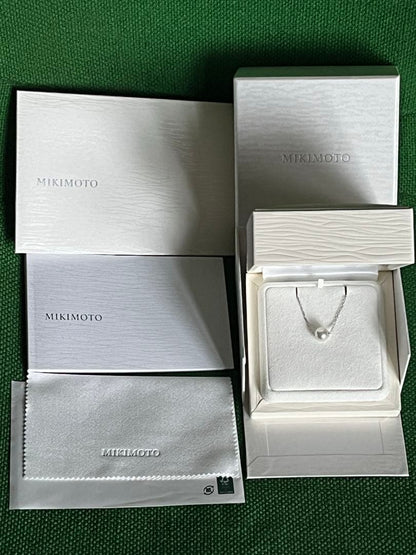 MIKIMOTO pearl necklace with 8.2mm pearls set in K18 white gold chain