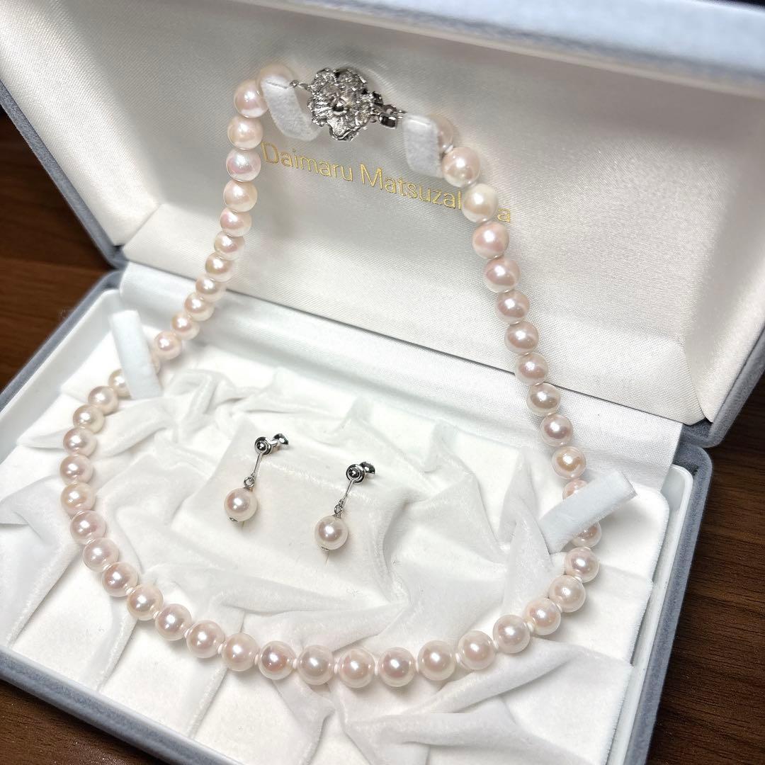 Daikoku Matsuzakaya light pink pearl necklace set with 40cm chain displayed on white background