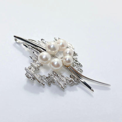 Mikimoto silver pearl pendant top featuring a 5.1 to 6.4 mm pearl without chain